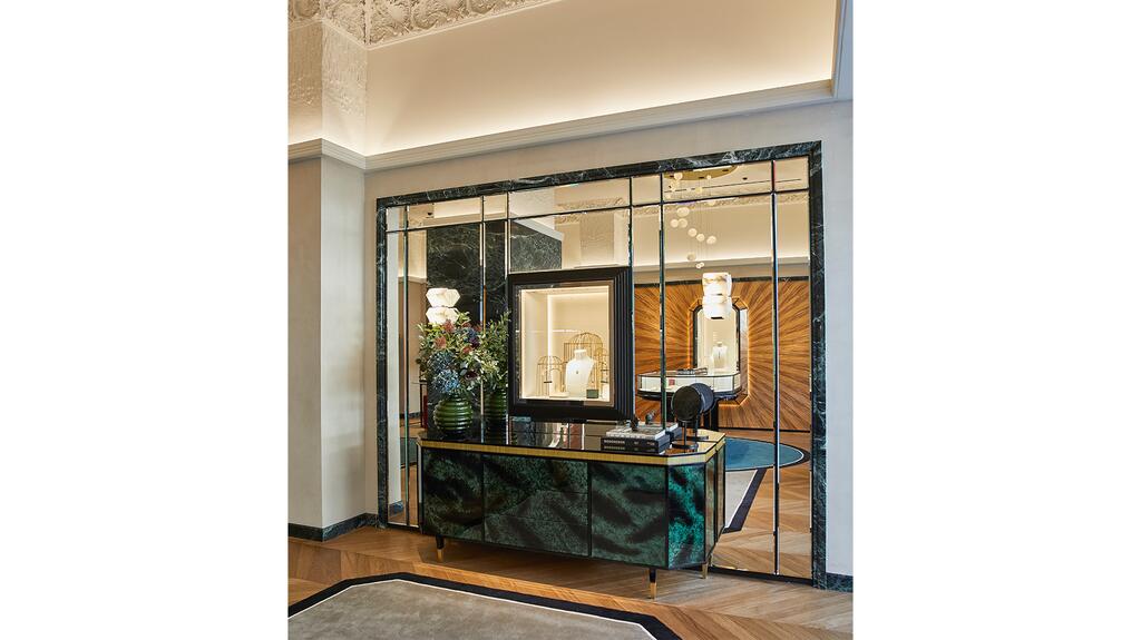 The reinterpreted wooden chest of drawers with green lacquer and shaped in an emerald cut Boucheron’s NY Store